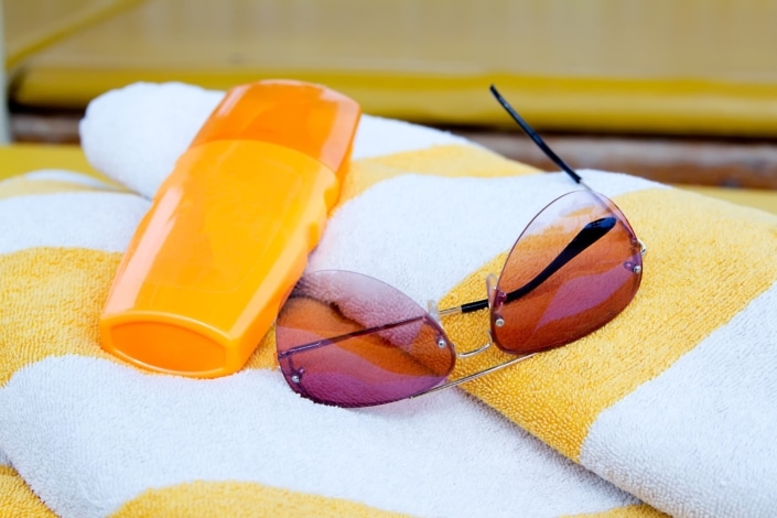 sunscreen and sunglasses